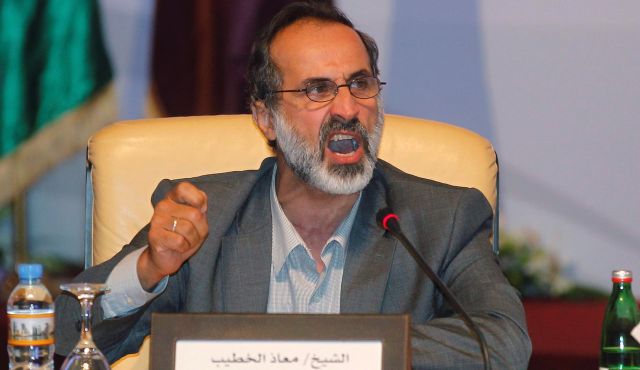Syria top opposition leader says willing to negotiate with Assad
